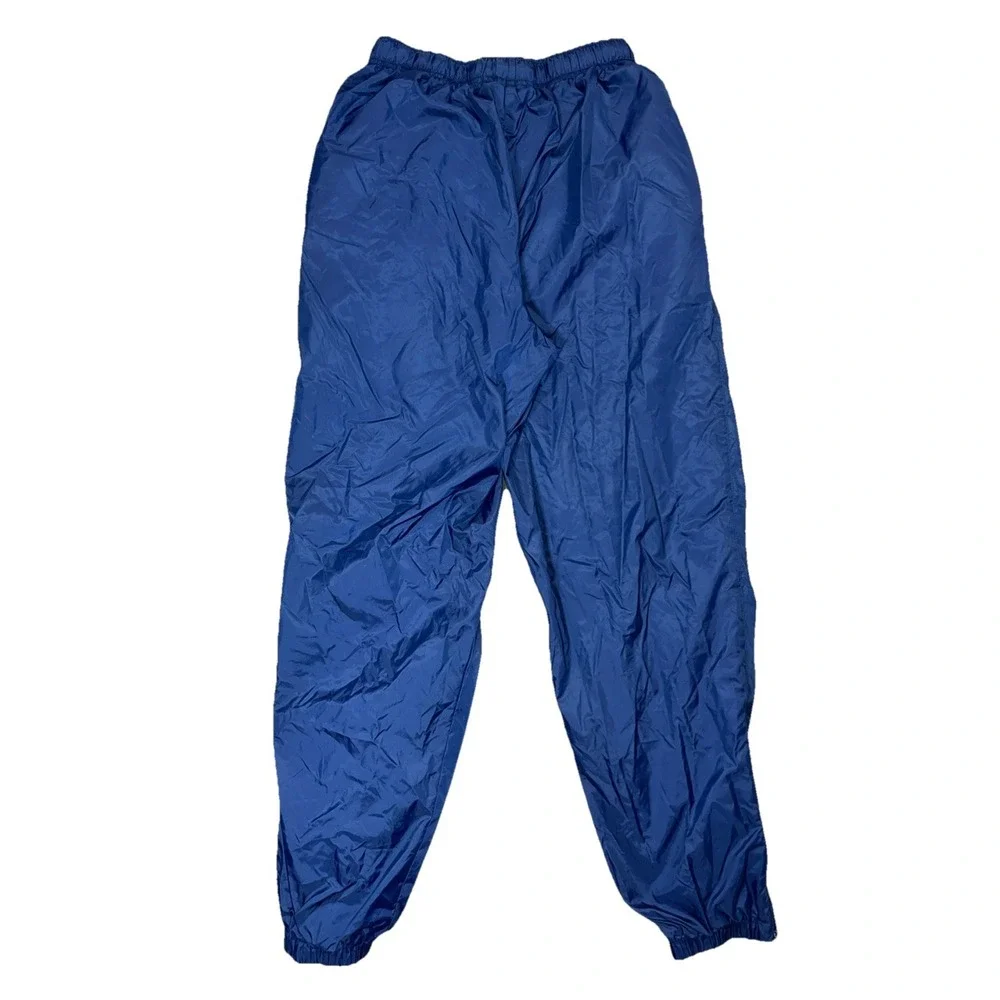 Vintage Nike Youth M (8-10) Blue Nylon Track Pants Zip Ankle Cinch Waist Retro
